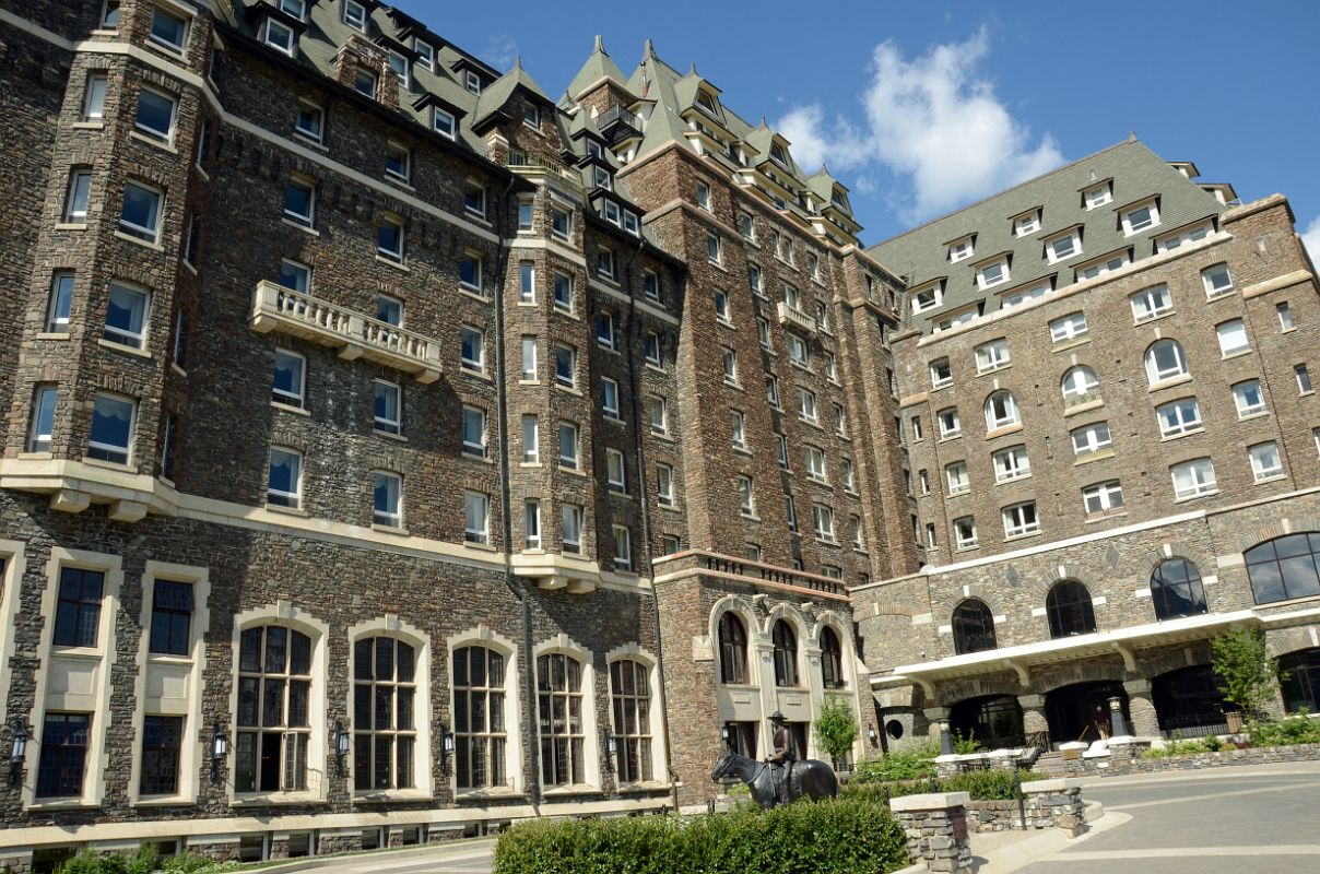 06 Banff Springs Hotel From Courtyard With A Statue Of An RCMP Riding A Horse